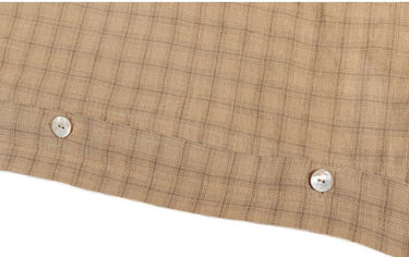 Funda nórdica Hanky Izamal de lino lavado en beige mostaza de Le Monde Sauvage, detalle del cierre con botones