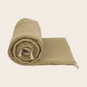 Sofa cover in a natural tone