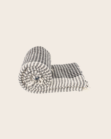 Houndstooth sofa cover in an interior setting