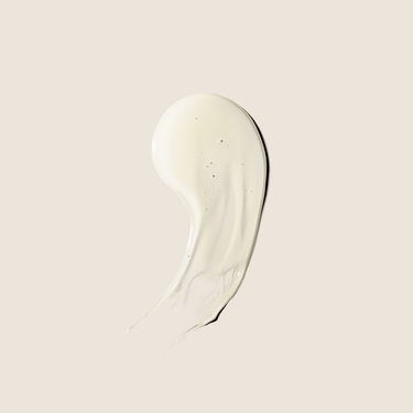 Gel de ducha de incienso y mirra de ALQVIMIA: Detalle de la textura del gel sobre fondo beige.