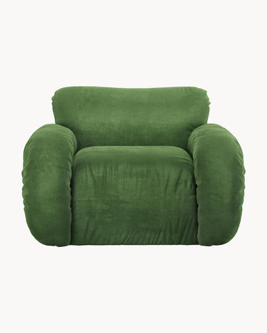 Detalle de tapizado en sillón Arc terciopelo verde HK Living
