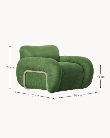 Sillón artesanal Arc verde oscuro HK Living en ambiente interior