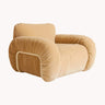 Detalle de sillón artesanal tapizado en terciopelo HK Living