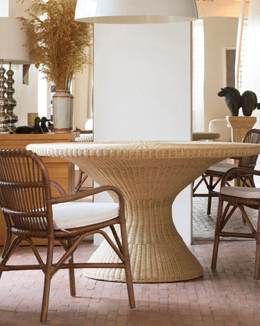 https://ik.imagekit.io/c2dr4dawp/https%3A%2F%2Fprofessional.mahehomeware.com%2Fwp-content%2Fuploads%2F2025%2F12%2Fmahehomeware-rattan-round-dining-table-oslo-natural-1.jpg?tr=f-jpg
