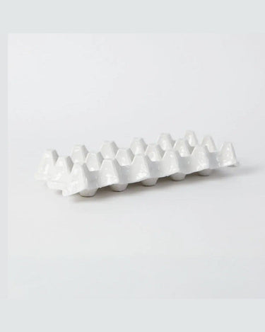 White ceramic egg holder for ten eggs by Olsson & Jensen