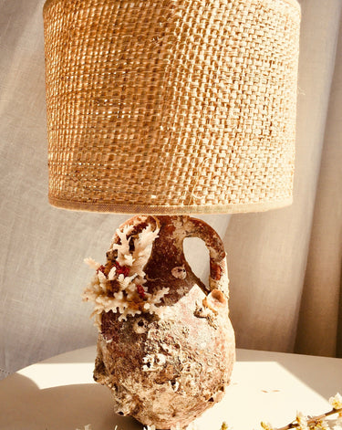 Terracotta lamp made with aged amphora with marine life