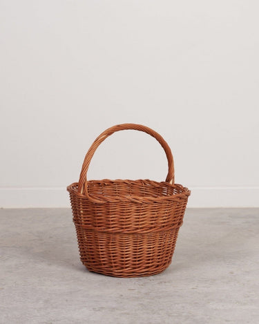 Cesta de mimbre redonda con asa reforzada y artesanal