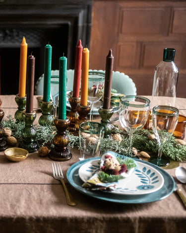 Hand-blown borosilicate glass pitcher in a natural interior setting