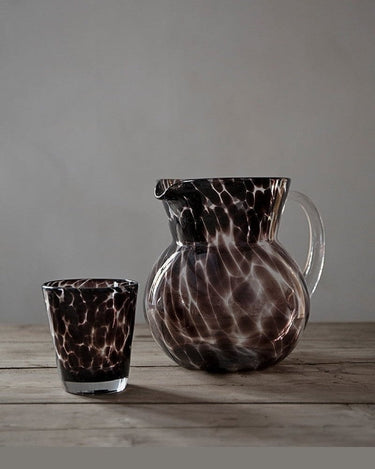 Detail of the hand-blown glass of the brown water jug by Olsson & Jensen