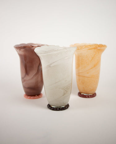 Taupe glass vase by Olsson & Jensen in a decorative setting