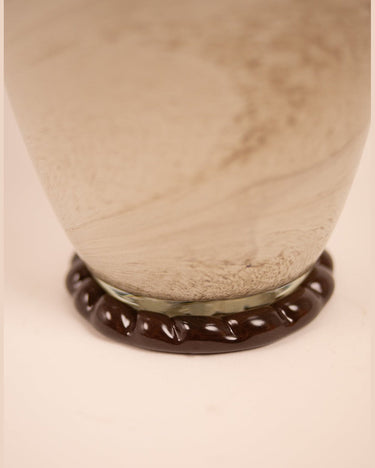Detail of a taupe glass vase in an Art Deco style