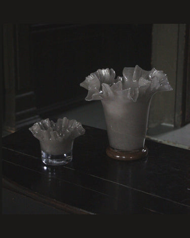Small taupe glass vase with dried flowers