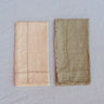 Servilletas de lino con punto de cruz de Bicla en tonos Dark Elm y Sunlight