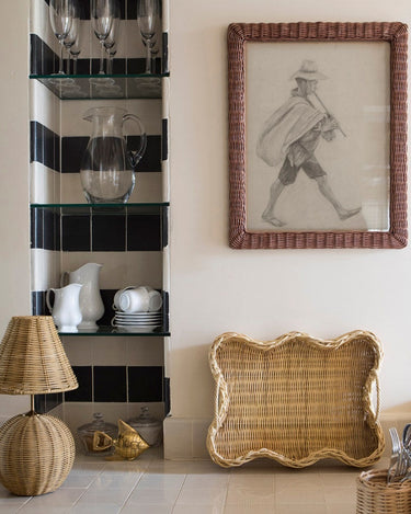 Cordless rattan lamp in an interior setting
