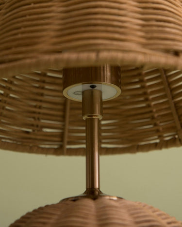 Table lamp with a rattan shade