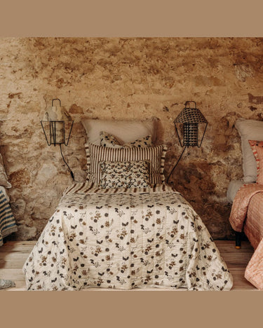 Cotton cushion with block print, in a styled interior by Le Monde Sauvage