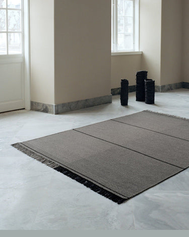 Alfombra Mindful Soul de lana piedra y gris Linie Design