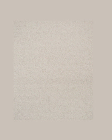 Alfombra Peaceful Parity de lana blanca con flecos Linie Design