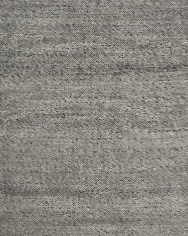 Alfombra Sirius de lana tono piedra con estrella nórdica Linie Design