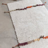 Alfombra reversible Zabol en un dormitorio cálido