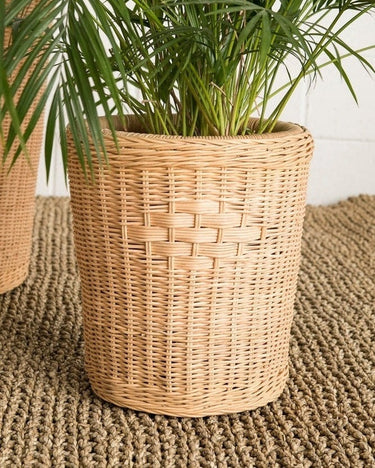 Handcrafted set of three round rattan planters