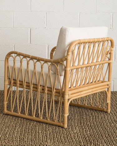 Sillón de ratán natural tejido a mano con cojín incluido