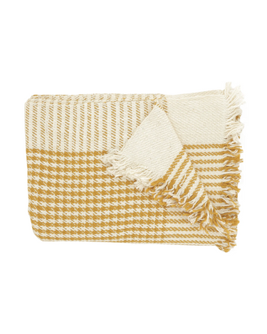 Detail of the Caravane houndstooth cotton throw