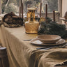 Mantel Matrijana Grano con servilletas Marinara en mesa natural