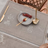 Mesa luminosa con mantel L’Automne de lino bordado