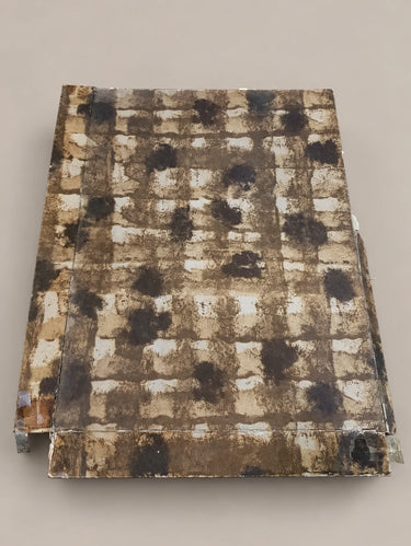 Caja cerrada de la presentación fotografiada de la mantelería.