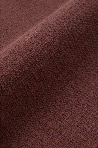 Detalle del algodón marsala tejido en telar