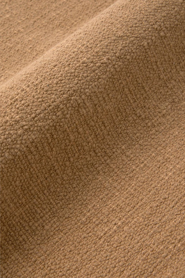 Detalle del algodón ocre tejido en telar de los manteles individuales