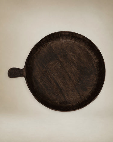 Detalle de la madera de mango del cuenco oxidado