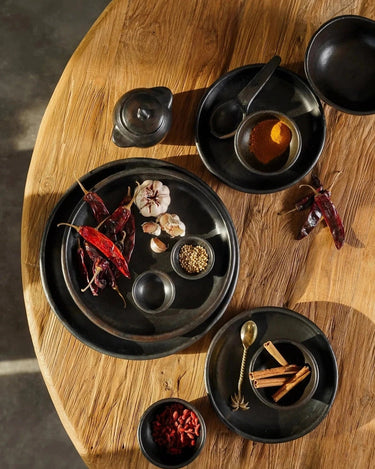 Small black ceramic plate by Bazar Bizar