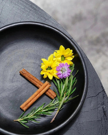 Small black ceramic plate by Bazar Bizar, handcrafted