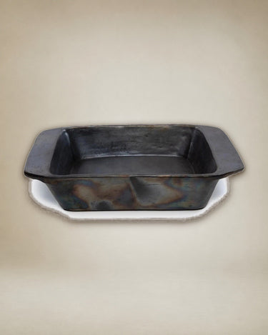 Black ceramic baking tray by Bazar Bizar for oven use