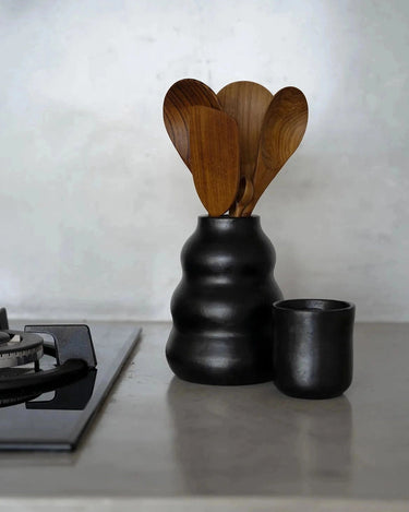 Burnt black ceramic cup by Bazar Bizar for hot drinks, handcrafted