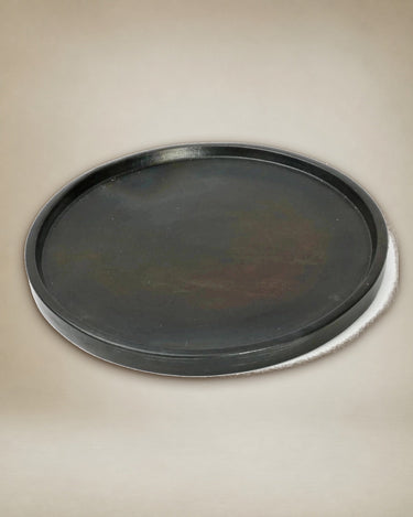 Plato llano negro de cerámica