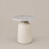 Mesa auxiliar redonda de terrazo gris y hierro negro de Broste Copenhagen