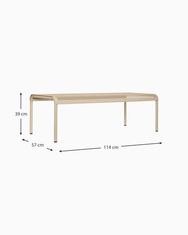 Esquema acotado de mesa beige: 114 × 57 cm y altura redondeada a 39 cm.