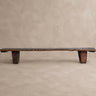 Mesa de centro de madera de teca marrón envejecido de Vical sobre fondo topo claro