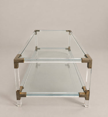 Mesa de centro transparente de dos niveles — vista del lado corto
