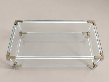 Mesa de centro transparente de dos niveles — vista cenital de la mesa rectangular