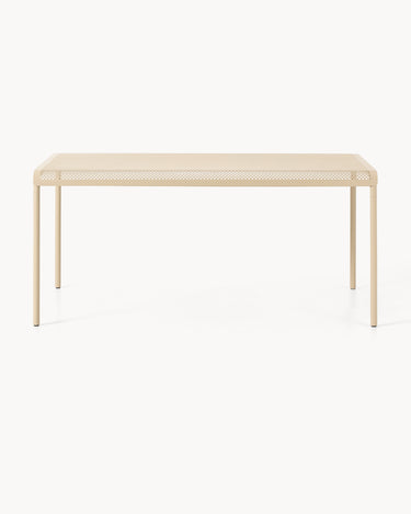 Una de las mesas de comedor Dapple beige, vista de frente con tablero perforado.