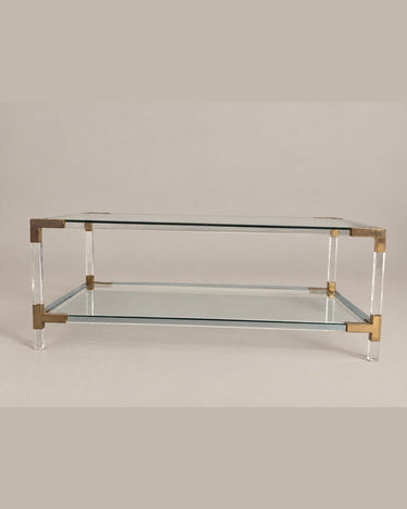 Mesa de centro transparente de dos niveles — perfil largo y patas
