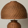 Large brown rattan shade for a ceiling lamp