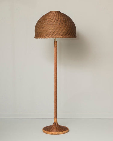 Detail of the lamp with a brown rattan shade