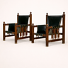 Pareja de sillones vintage de madera y asiento negro
