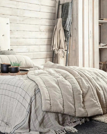 Pie de cama ASHTI Dareels en lino natural