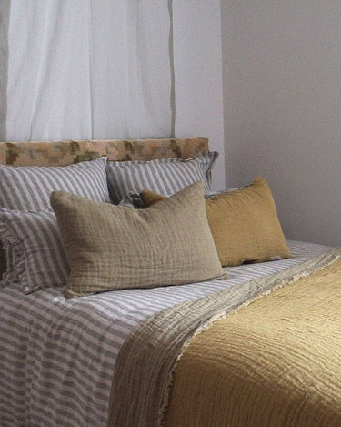 Plaid de lino gofrado reversible con flecos bicolor Le Monde Sauvage